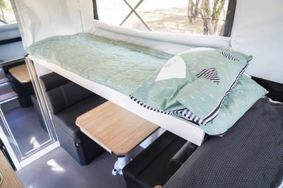 Convert Cafe dinette to a bunk with drop down table and cushion insert 