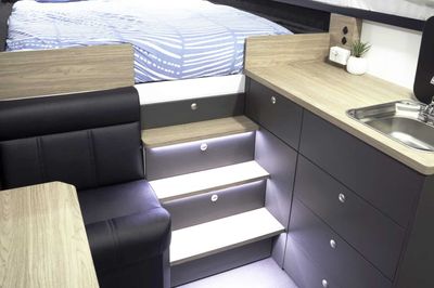 Staircase for easy access to queen bed