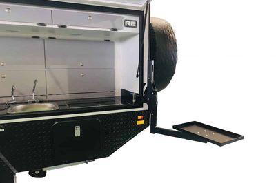 Swing out drop down table 