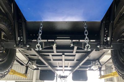 Chassis and underbody undercoated, sealed and coated with stone guard anti-chip paint